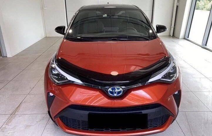 
								Toyota C-HR Orange hybride full									