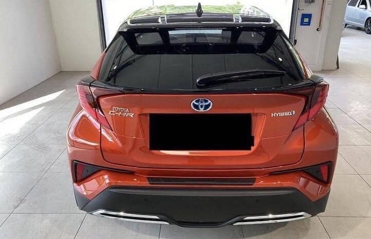 
								Toyota C-HR Orange hybride full									